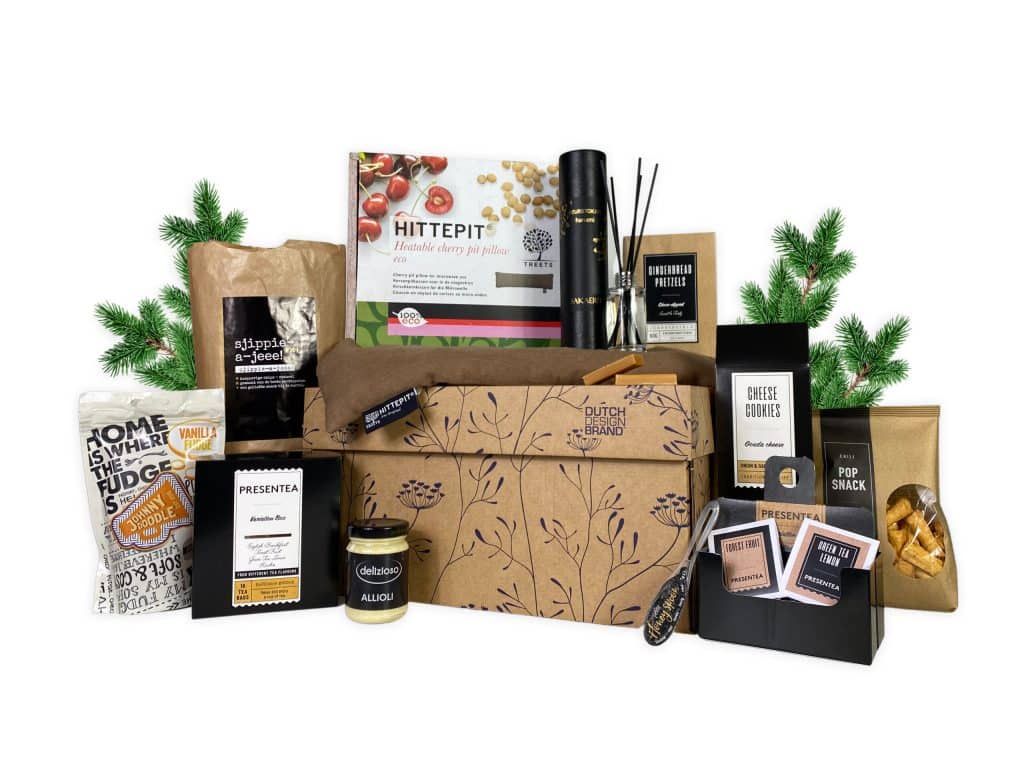 Kerstpakket Relaxation box is ideaal om even te ontspannen met verschillende etenswaren, een hittepit en een herbruikbare kartonnen doos