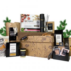 Kerstpakket Relaxation box is ideaal om even te ontspannen met verschillende etenswaren, een hittepit en een herbruikbare kartonnen doos